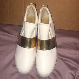 White and gold outing women shoes.
